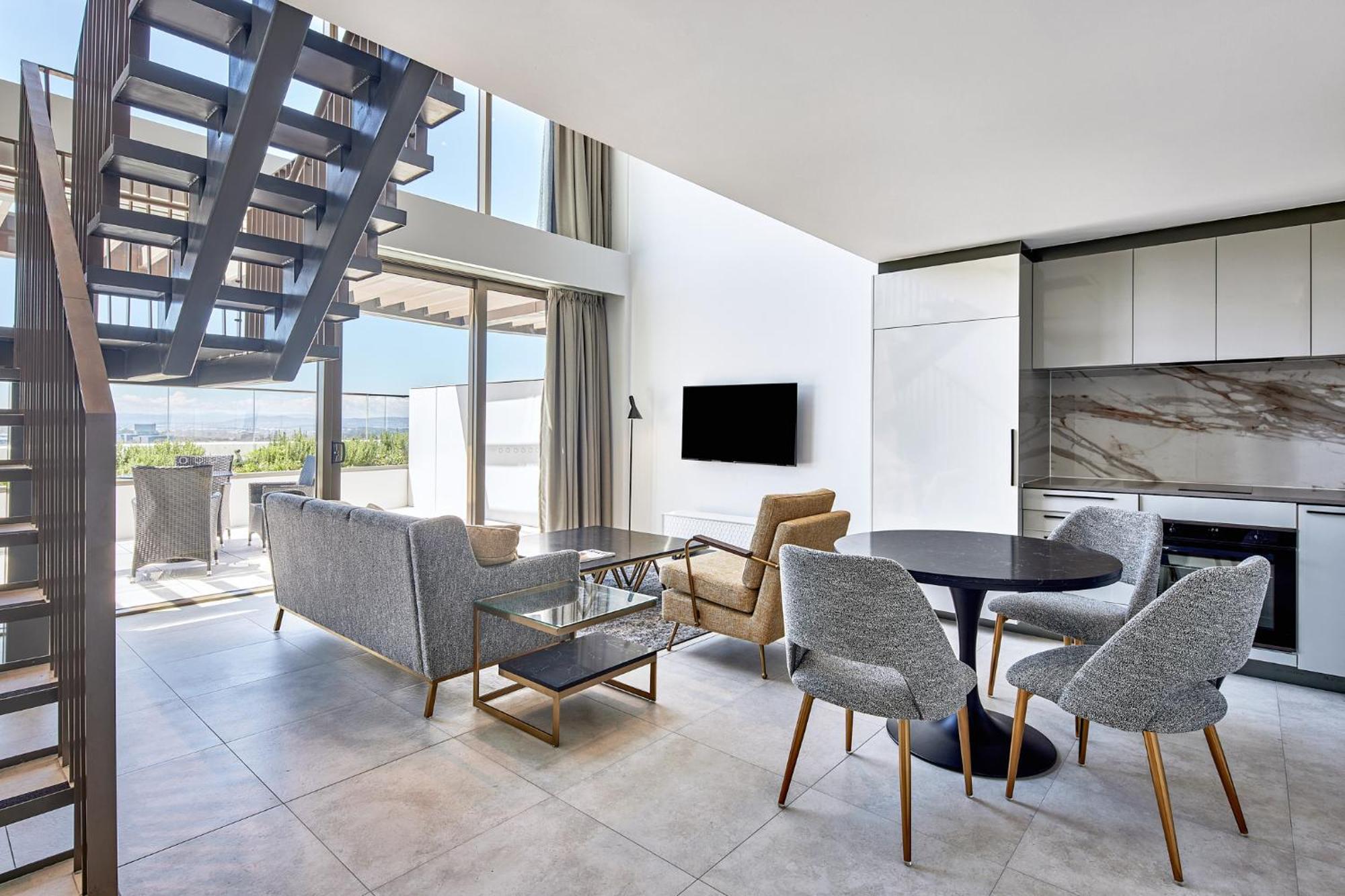 Meriton Suites Camberra Exterior foto A living room at the hotel